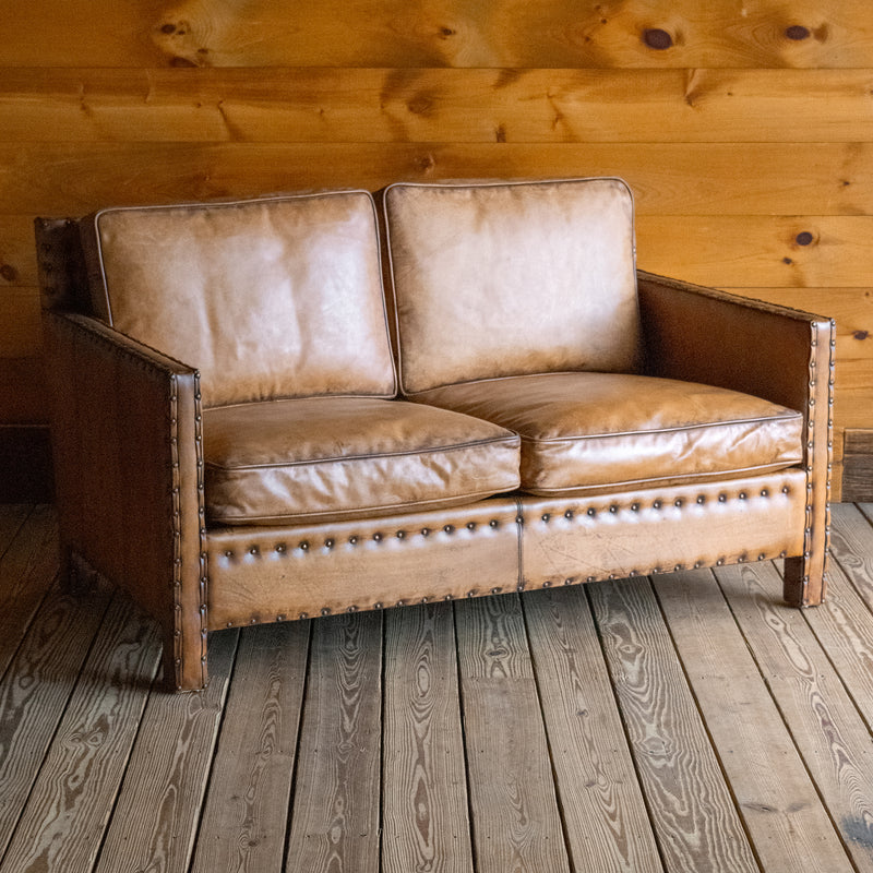 Rustic Square Buffalo Leather Loveseat with Nailhead Trim, Angled Front View