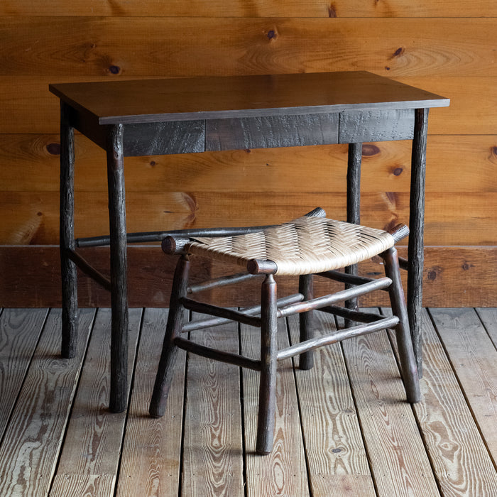 36" Rough-Sawn Dark Pine & Hickory Writing Desk with Dovetail Drawer, Angled Front View with Camp Stool