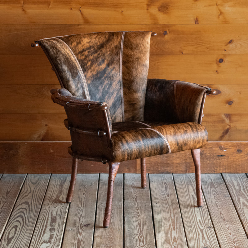 Rustic Black and Brown Brindle Hair-on-Hide Leather Chair with Ribbed Back, Angled Front View