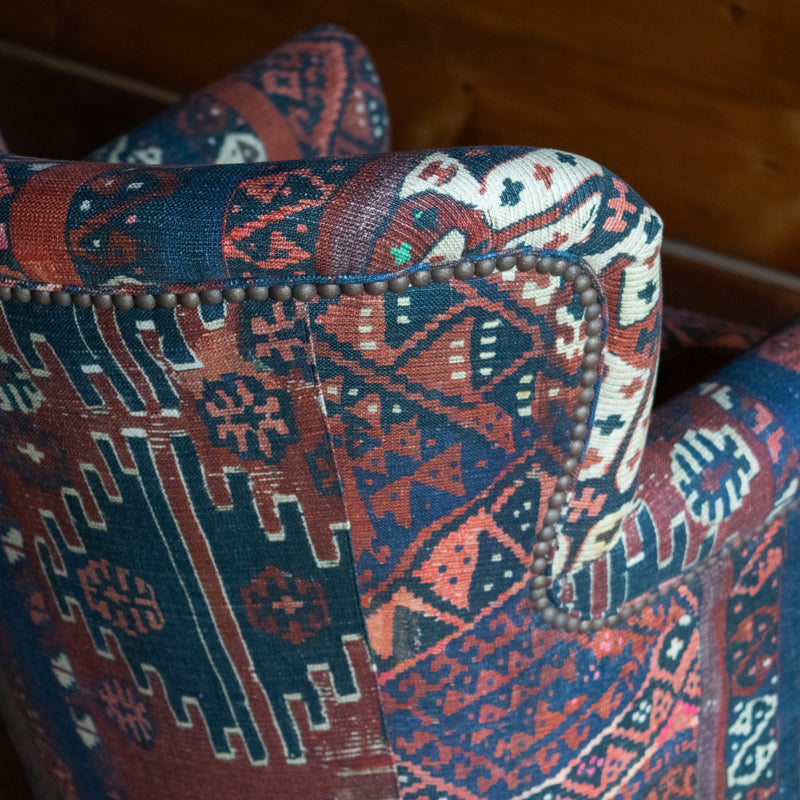 Petite Tightback Armchair Upholstered in Blue, Red, and Pink Abstract Kilim Fabric, Nailhead Detail