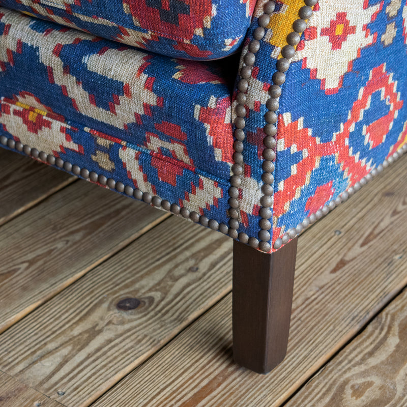 Petite Tightback Armchair Upholstered in Blue, Red, and Yellow Kilim Fabric, Leg Detail