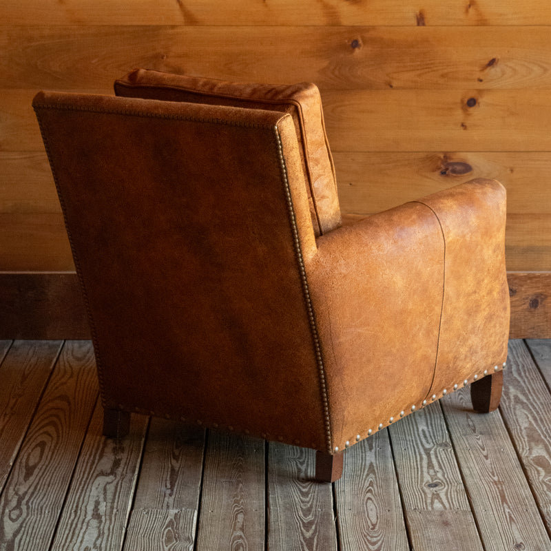 Rustic Distressed Brown Leather Lounge Chair with Nailhead Trim, Angled Back View