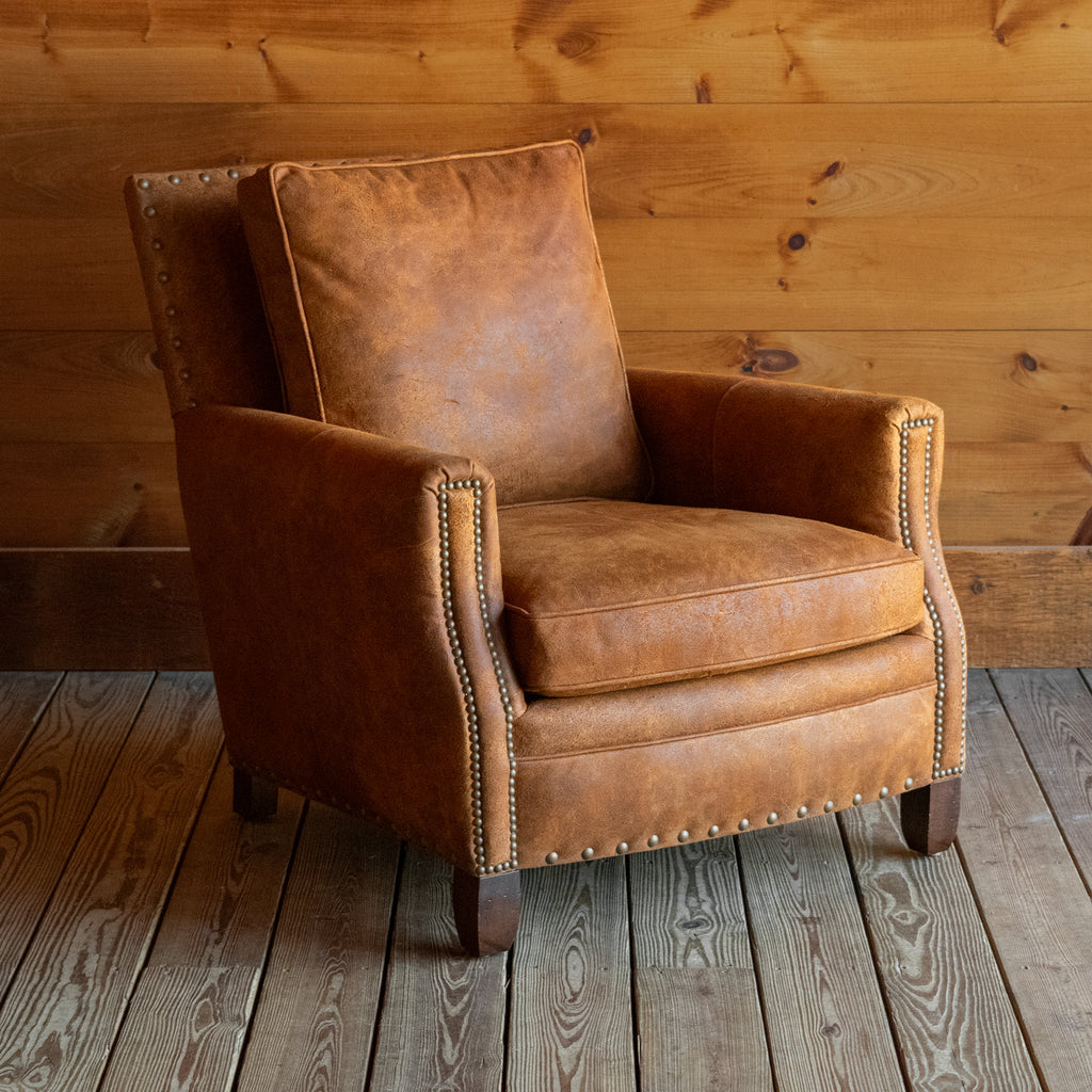 Rustic Distressed Brown Leather Lounge Chair with Nailhead Trim, Angled Front View