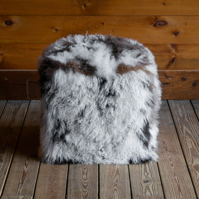 Two Multi-Color Spotted Curly Sheepskin Cube Ottomans, Side by Side 