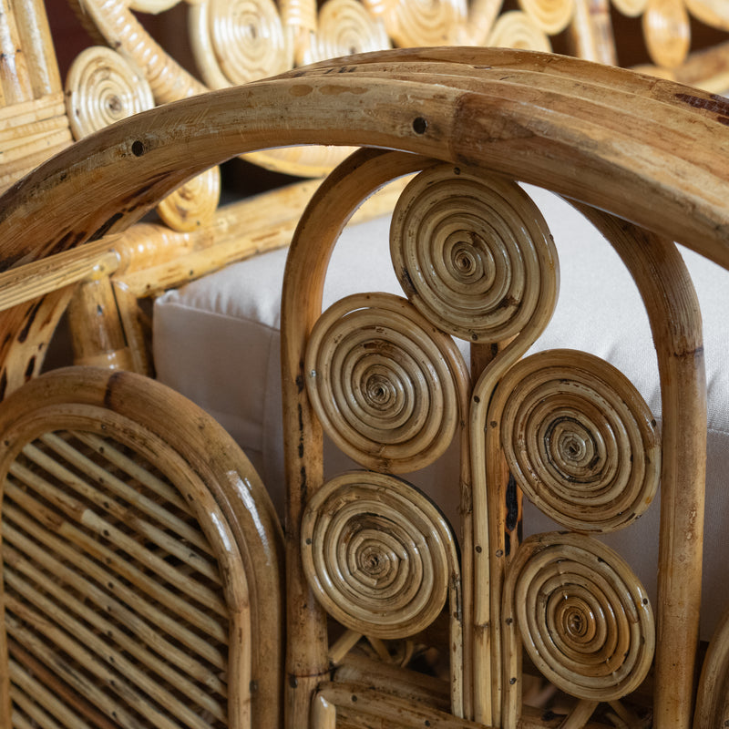 Handcrafted Rattan Sofa with Sunflower Details and Off-White Sunbrella Bench Seat Cushion, Armrest Detail